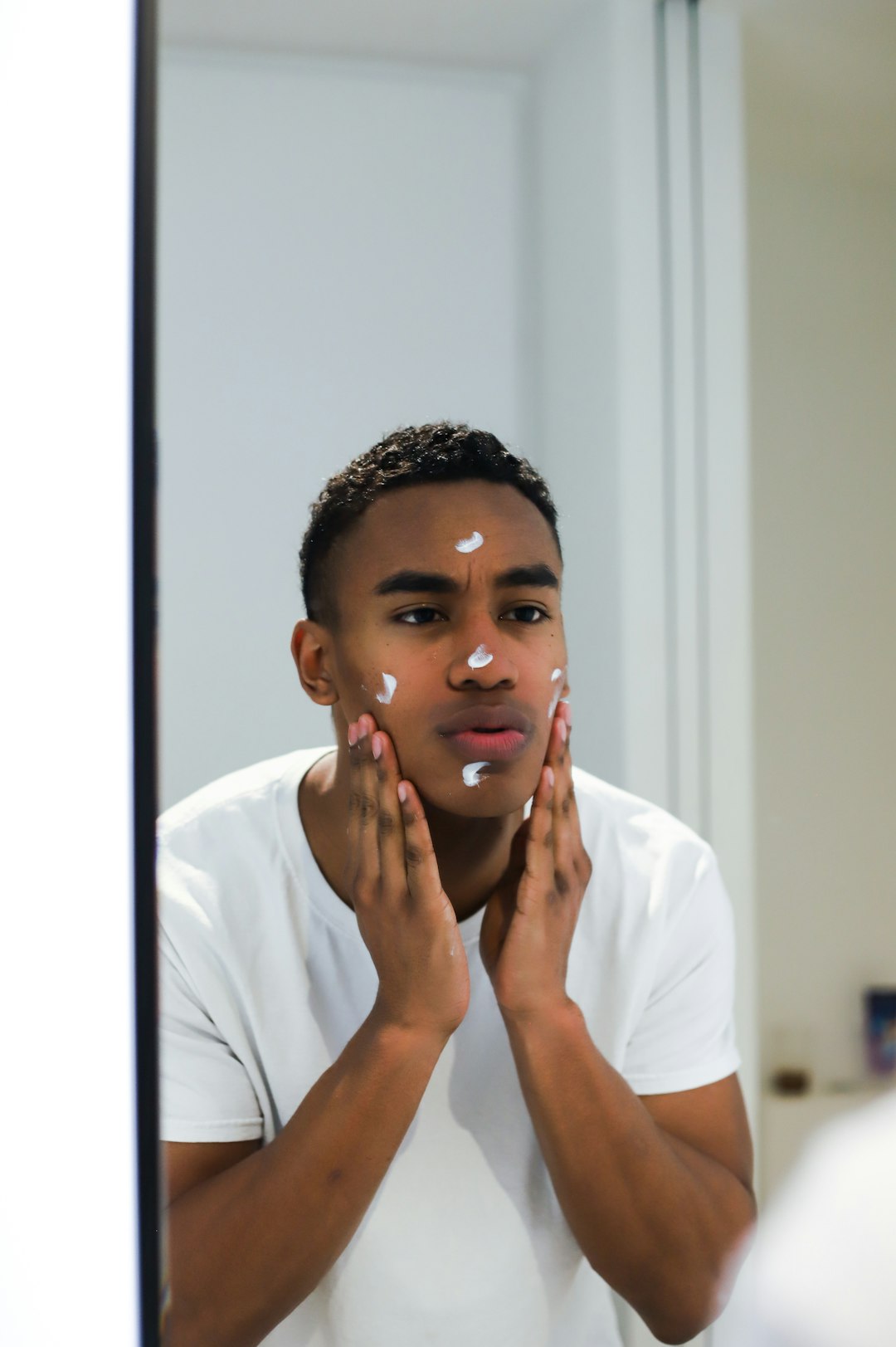 Skincare products arranged for a gentle pH-conscious routine