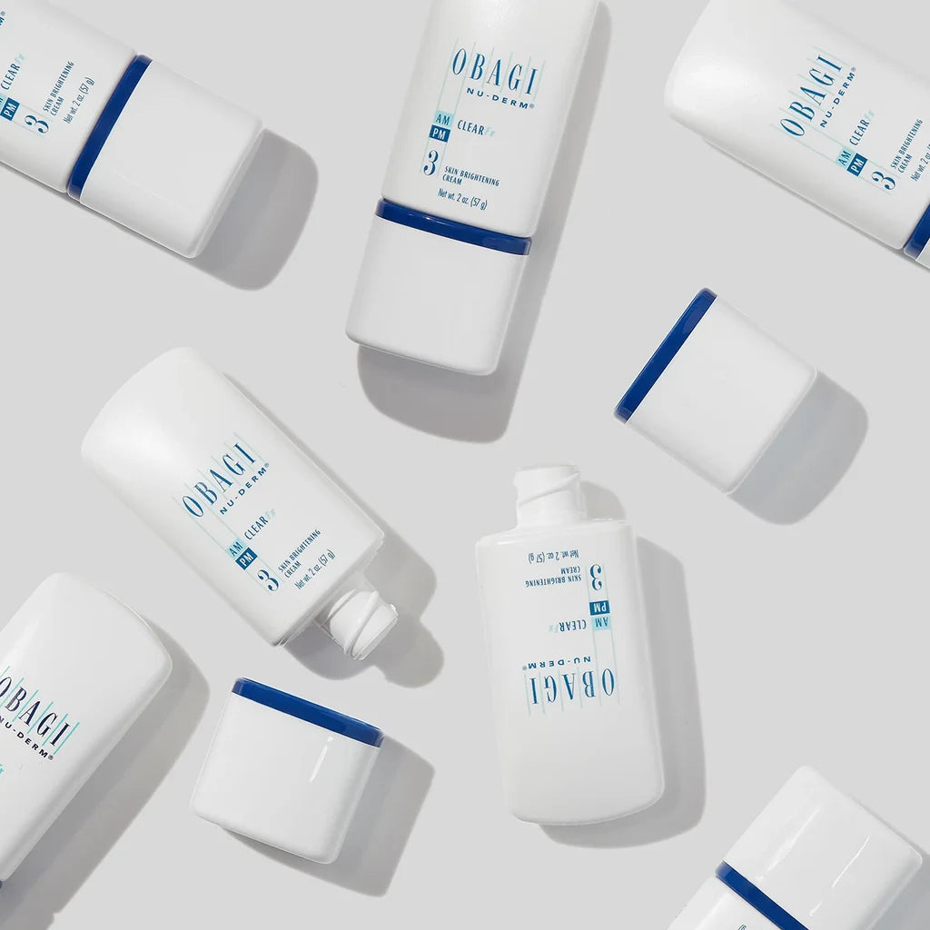 Obagi skincare products arranged on a light gray background