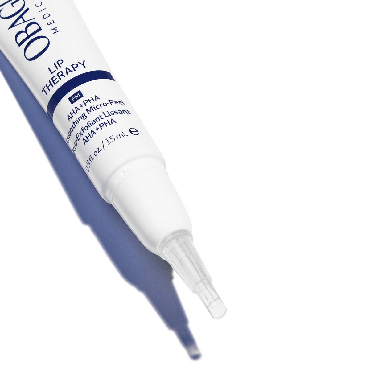 A close-up of a white OBG Medics Lip Therapy applicator tube with blue text, shown diagonally on a white background with a soft blue shadow.