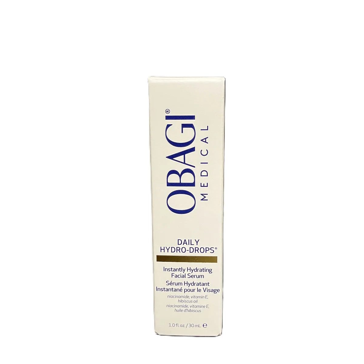 A tall, narrow white box of OBAGI Medical Daily Hydro-Drops facial serum, featuring blue text and a gold accent band, set against a plain white background.