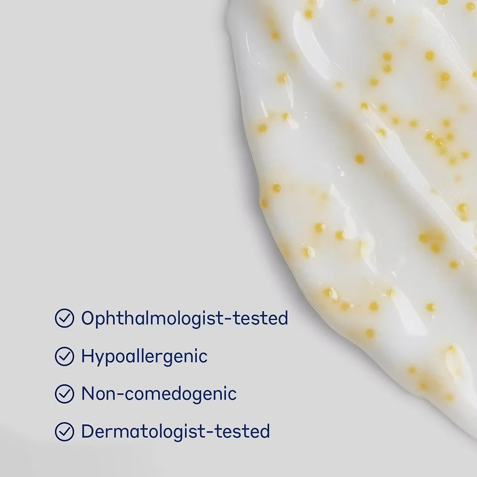 Close-up of a skincare product with text indicating it is ophthalmologist-tested, hypoallergenic, non-comedogenic, and dermatologist-tested.